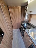 Brand new Touring Caravan Sited all Setup Ready