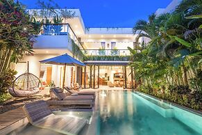 Luxury 4BR Haven, Steps to Canggu's Beach Elegance