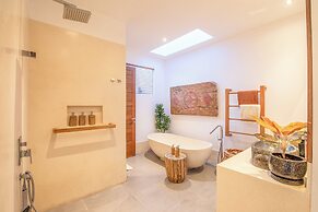 Luxury 4BR Haven, Steps to Canggu's Beach Elegance