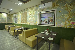 Q Saina's S K Regency