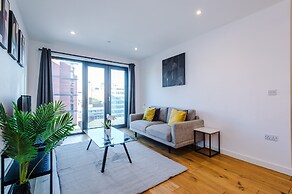 Sleek Apartment with Wine Fridge