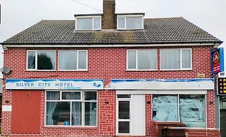 OYO The Silver City Hotel