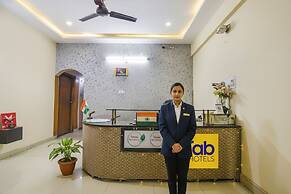 Fabhotel Maadhavam Residence
