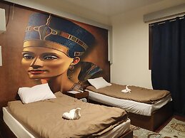 Nefertiti Pyramids View