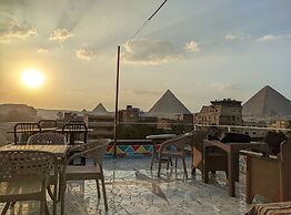 Nefertiti Pyramids View