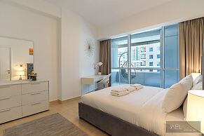 WelHome - Mesmerizing 1BR Apartment in Damac Waves A