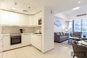 WelHome - Mesmerizing 1BR Apartment in Damac Waves A