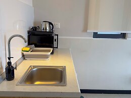 Neu Suites By Serenity Vacation Homes