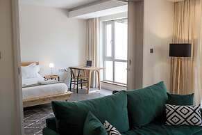Capital M Apartments by YourHost
