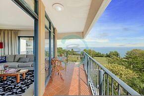 Coastal Elegance Sunset Pool Balcony Dining
