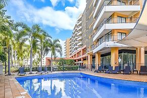 Coastal Elegance Sunset Pool Balcony Dining