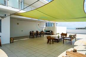 Zen Mitchell Rooftop Outdoor Dining Oceanview