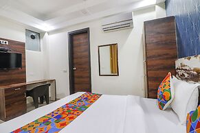 Fabhotel Empire Suites