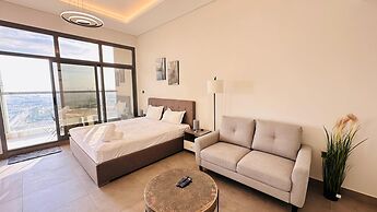 Spacious Studio Apartment Burj View with Balcony Free Parking by Belvi