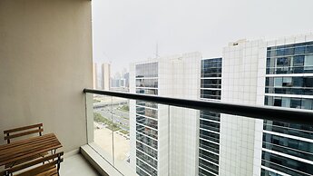 Spacious Studio Apartment Burj View with Balcony Free Parking by Belvi