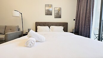 Spacious Studio Apartment Burj View with Balcony Free Parking by Belvi