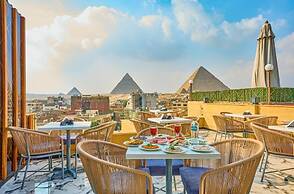 Cleopatra Tower Pyramids Hotel