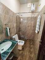 Goroomgo Anugraha Homestay Ramnagar