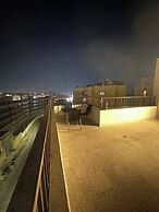 JRE Cozy Rooftop Near Al Services-23