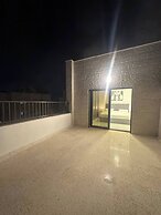 JRE Cozy Rooftop Near Al Services-23