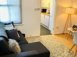One-bedroom Near Mathematical Bridge by Belvilla