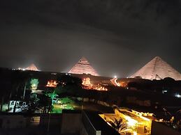 Malak pyramids inn
