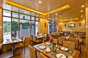 Goroomgo New Harmony Inn Manali