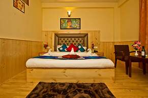 Goroomgo New Harmony Inn Manali