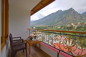 Goroomgo New Harmony Inn Manali