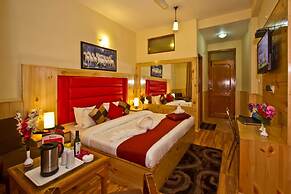Goroomgo New Harmony Inn Manali