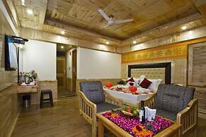 Goroomgo New Harmony Inn Manali