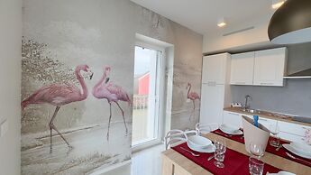 Fairmont Seafront Flamingo Suite by Ca-sa Check