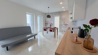 Fairmont Seafront Flamingo Suite by Ca-sa Check