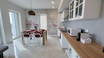 Fairmont Seafront Flamingo Suite by Ca-sa Check