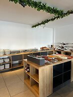 Rena Grand Residence & Suite