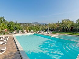 Belvilla by OYO Comfortable Apartment With Pool