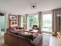 Nice Holiday Home on the Water