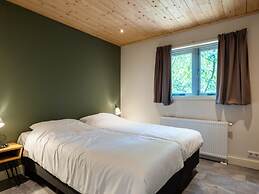 Forest Lodge in Nature With Pond Views