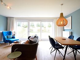 Modern Apartment Near Beach and Garden Views