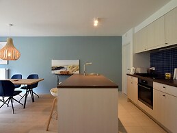 Modern Apartment Near Beach and Garden Views