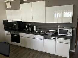 Apartment With Balcony on the Upper Floor