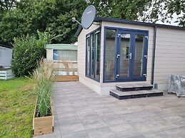 Chalet With Dishwasher in a Park