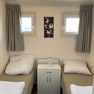 Chalet With Dishwasher in a Park