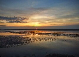 Sun, Mudflats and sea