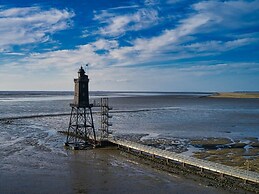 Sun, Mudflats and sea