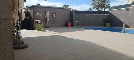 Belvilla by OYO Apartamento con Patio