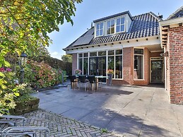 Characteristic House With Wellness in Augustinusga