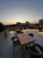 Pyramids Heritage INN