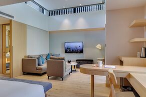 Boutech Wuri Village Hotel