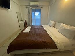 OYO 75494 President Apartment